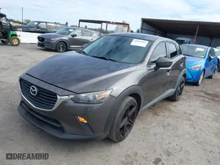 2016 Mazda CX-3 Sport with VIN JM1DKBB75G0114507, listed as a IAAI auction lot 41858416 with 152,822 mi miles. Bid and sale history available at carsss.com. Image 2.