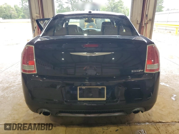 2013 Chrysler 300 SRT-8 z VIN 2C3CCAFJ5DH652791, wystawiony jako Copart lot #55895915 z przebiegiem 146 485 mil mil oraz Szkoda całkowita • Salvage title. Historia ofert i sprzedaży dostępna na DreamBid. Obrazek 6.