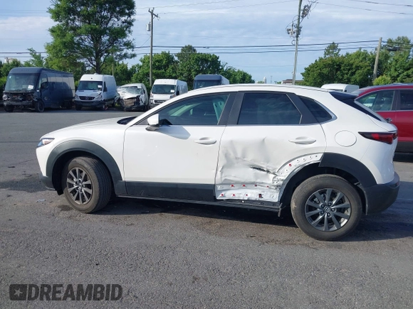 2023 Mazda CX-30 S with VIN 3MVDMBAM8PM545288, listed as a IAAI auction lot 42198433 with 19,609 mi miles and . Bid and sale history available at DreamBid. Image 14.