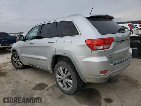 2011 Jeep Grand Cherokee 70th Anniversary with VIN 1J4RR4GT0BC666579, listed as a Copart auction lot 87322784 with 163,439 mi miles and Salvage Title. Bid and sale history available at carsss.com. Image 2.