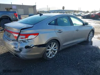 2013 Hyundai Azera with VIN KMHFH4JG3DA230844, listed as a IAAI auction lot 41817997 with 129,163 mi miles. Bid and sale history available at carsss.com. Image 4.
