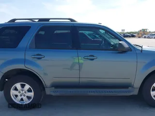 2010 Mercury Mariner with VIN 4M2CN8B76AKJ28671, listed as a IAAI auction lot 42222981 with 167,345 mi miles and . Bid and sale history available at DreamBid. Image 13.