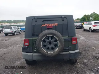 2007 Jeep Wrangler Unlimited X with VIN 1J4GA39127L231378, listed as a IAAI auction lot 42252475 with 152,568 mi miles and . Bid and sale history available at DreamBid. Image 17.