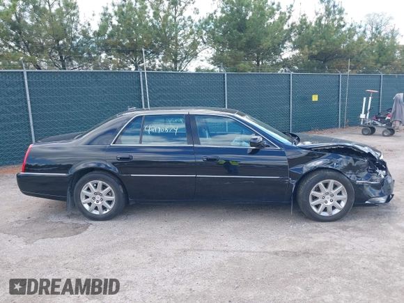 2009 Cadillac DTS 1SC z VIN 1G6KD57Y29U141800, wystawiony jako IAAI lot #42190874 z przebiegiem 115 043 mil mil oraz . Historia ofert i sprzedaży dostępna na DreamBid. Obrazek 13.