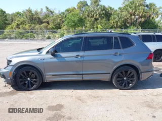 2020 Volkswagen Tiguan SE with VIN 3VV3B7AX3LM176300, listed as a IAAI auction lot 42004744 with 86,074 mi miles and . Bid and sale history available at DreamBid. Image 14.