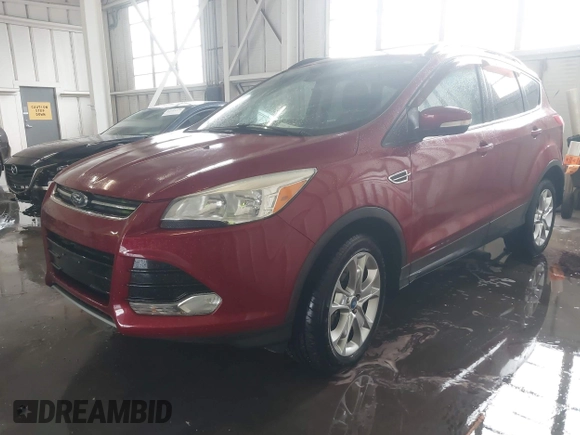 2013 Ford Escape SEL z VIN 1FMCU9HX2DUB79885, wystawiony jako IAAI lot #42341050 z przebiegiem 117 236 mil mil oraz . Historia ofert i sprzedaży dostępna na DreamBid. Obrazek 2.
