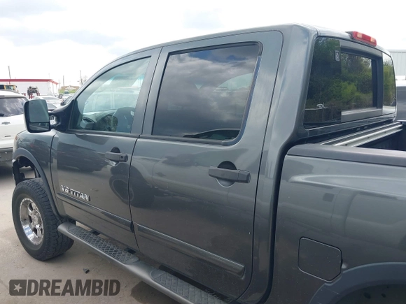 2011 Nissan Titan Pro-4X with VIN 1N6BA0EC3BN320795, listed as a IAAI auction lot 41868113 with 183,919 mi miles and . Bid and sale history available at DreamBid. Image 14.