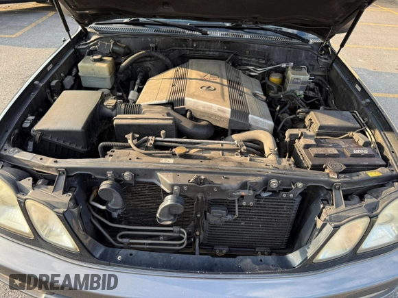 2004 Lexus LX 470 with VIN JTJHT00W44354386, listed as a Copart auction lot 63816455 with 389,442 mi miles and Clean title. Bid and sale history available at DreamBid. Image 7.