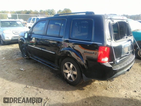 2012 Honda Pilot Touring with VIN 5FNYF3H90CB035309, listed as a IAAI auction lot 41063215 with 228,081 mi miles and . Bid and sale history available at carsss.com. Image 3.