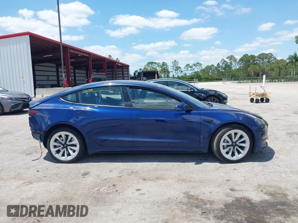 2023 Tesla Model 3 with VIN 5YJ3E1EA0PF658080, listed as a IAAI auction lot 42008846 with 32,301 mi miles and . Bid and sale history available at carsss.com. Image 14.