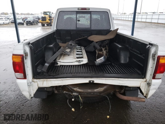 1999 Ford Ranger XLT with VIN 1FTYR14X3XPB21905, listed as a Copart auction lot 82248924 with 273,376 mi miles and Salvage Title. Bid and sale history available at DreamBid. Image 6.