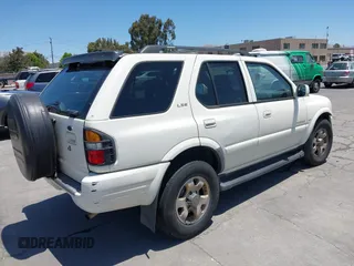 1999 Isuzu Rodeo S with VIN 4S2CK58W1X4344442, listed as a IAAI auction lot 42519582 with 185,098 mi miles and . Bid and sale history available at DreamBid. Image 4.