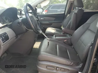 2014 Honda Odyssey Touring with VIN 5FNRL5H91EB015162, listed as a Copart auction lot 60643135 with 176,898 mi miles and Salvage title. Bid and sale history available at DreamBid. Image 7.