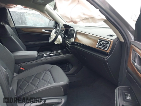 2024 Volkswagen Atlas SE with VIN 1V2HR2CA4RC593252, listed as a IAAI auction lot 41828371 with 7,317 mi miles and . Bid and sale history available at DreamBid. Image 5.
