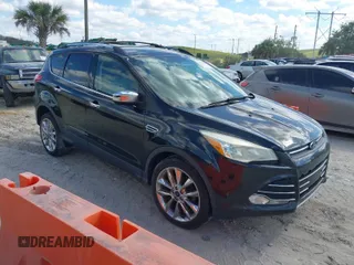 2015 Ford Escape SE with VIN 1FMCU0GX7FUB56506, listed as a IAAI auction lot 38653769 with 92,593 mi miles. Bid and sale history available at carsss.com. Image 1.