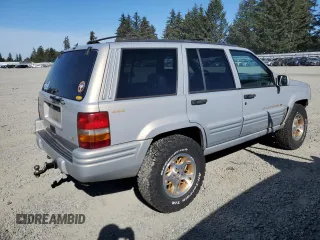 1997 Jeep Grand Cherokee Limited with VIN 1J4GZ78Y5VC598822, listed as a Copart auction lot 74306474 with 276,454 mi miles and Salvage Title. Bid and sale history available at carsss.com. Image 3.