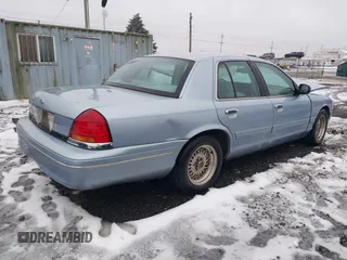 1998 Ford Crown Victoria LX с VIN 2FAFP74W4WX100549, выставлен на аукционе IAAI как лот 41573494 с пробегом 114 818 миль миль и . История ставок и продаж доступна на DreamBid. Изображение 4.