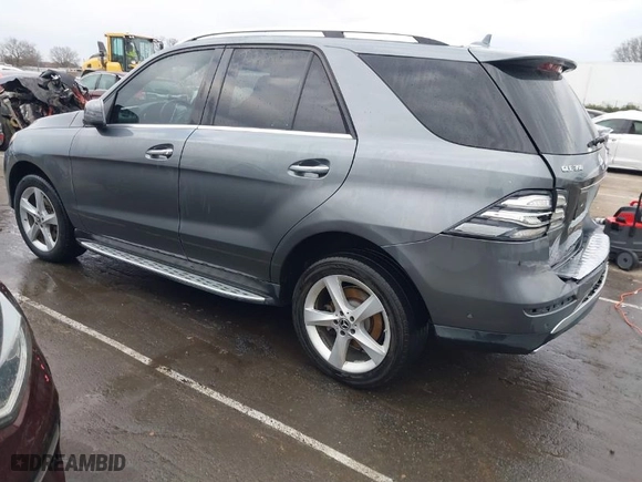 2017 Mercedes-Benz GLE with VIN 4JGDA5HB9HA992609, listed as a IAAI auction lot 41724638 with 205,921 mi miles. Bid and sale history available at carsss.com. Image 3.