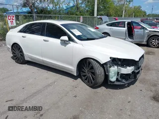 2017 Lincoln MKZ Select z VIN 3LN6L5C98HR607862, wystawiony jako IAAI lot #42072856 z przebiegiem 37 357 mil mil oraz . Historia ofert i sprzedaży dostępna na DreamBid. Obrazek 1.