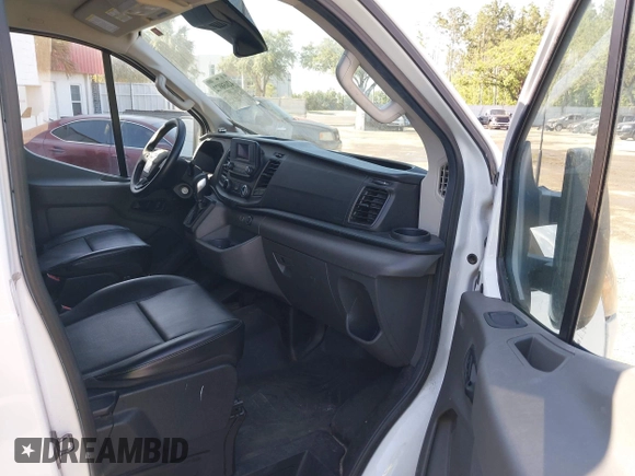 2021 Ford Transit Cargo with VIN 1FTBR1Y82MKA53386, listed as a IAAI auction lot 42058972 with 98,677 mi miles. Bid and sale history available at carsss.com. Image 5.