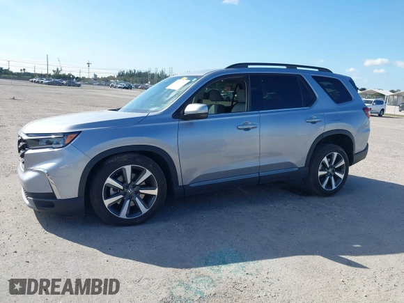 2023 Honda Pilot Elite with VIN 5FNYG1H83PB018826, listed as a IAAI auction lot 41301261 with 23,252 mi miles. Bid and sale history available at carsss.com. Image 17.