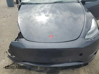 2024 Tesla Model Y z VIN 7SAYGDED4RA331714, wystawiony jako Copart lot #57043915 z przebiegiem Nie podano mil oraz Szkoda całkowita • Salvage title. Historia ofert i sprzedaży dostępna na DreamBid. Obrazek 12.