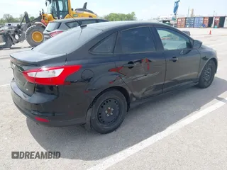 2012 Ford Focus SE with VIN 1FAHP3F24CL275128, listed as a IAAI auction lot 42121816 with 200,716 mi miles and . Bid and sale history available at carsss.com. Image 4.