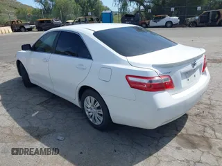 2009 Toyota Camry with VIN 4T4BE46K09R069059, listed as a IAAI auction lot 41852406 with 213,992 mi miles. Bid and sale history available at carsss.com. Image 3.