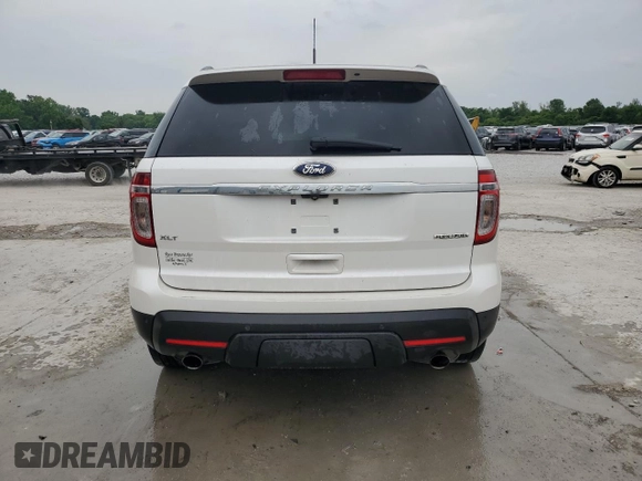 2014 Ford Explorer XLT z VIN 1FM5K7D84EGC21975, wystawiony jako Copart lot #58429485 z przebiegiem 159 240 mil mil oraz Szkoda całkowita • Salvage title. Historia ofert i sprzedaży dostępna na DreamBid. Obrazek 6.