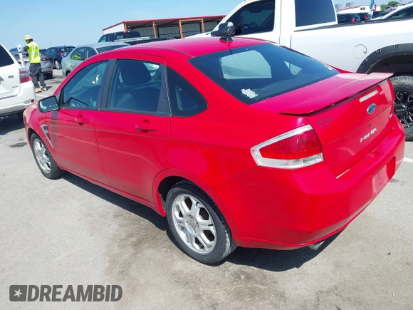 2008 Ford Focus SE with VIN 1FAHP35N98W125632, listed as a IAAI auction lot 42204436 with 232,509 mi miles and . Bid and sale history available at carsss.com. Image 3.