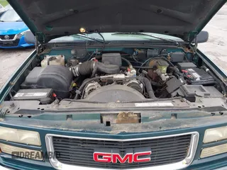1996 GMC Suburban z VIN 1GKFK16ROTJ725925, wystawiony jako IAAI lot #42244433 z przebiegiem 123 837 mil mil oraz . Historia ofert i sprzedaży dostępna na DreamBid. Obrazek 10.