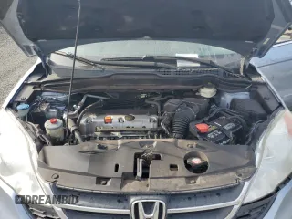 2011 Honda CR-V SE z VIN 5J6RE4H45BL083041, wystawiony jako Copart lot #50223365 z przebiegiem 120 608 mil mil oraz Szkoda całkowita • Salvage title. Historia ofert i sprzedaży dostępna na DreamBid. Obrazek 13.