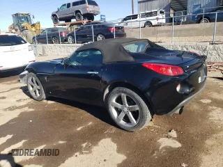 2009 Pontiac Solstice GXP z VIN 1G2MT35X19Y105245, wystawiony jako Copart lot #89054685 z przebiegiem 141 283 mil mil oraz Szkoda całkowita • Salvage title. Historia ofert i sprzedaży dostępna na DreamBid. Obrazek 2.