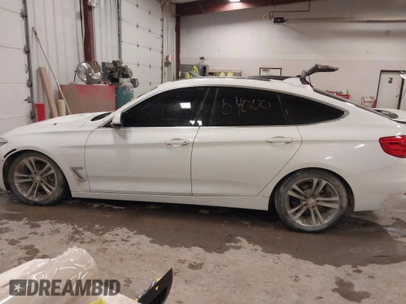 2016 BMW 3 Series GT 328i xDrive with VIN WBA8Z5C54GG500965, listed as a IAAI auction lot 41254000 with 115,672 mi miles. Bid and sale history available at carsss.com. Image 14.
