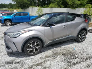 2020 Toyota C-HR LE z VIN NMTKHMBX2LR107215, wystawiony jako Copart lot #60796255 z przebiegiem 94 610 mil mil oraz Czysty tytuł • Clean title. Historia ofert i sprzedaży dostępna na DreamBid. Obrazek 1.