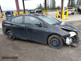 2020 Toyota Prius L Eco with VIN JTDKARFUXL3115471, listed as a IAAI auction lot 41831411 with 48,378 mi miles. Bid and sale history available at carsss.com. Image 12.