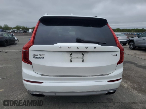 2017 Volvo XC90 Momentum z VIN YV4A22PK0H1177183, wystawiony jako Copart lot #57875645 z przebiegiem 72 339 mil mil oraz Szkoda całkowita • Salvage title. Historia ofert i sprzedaży dostępna na DreamBid. Obrazek 6.