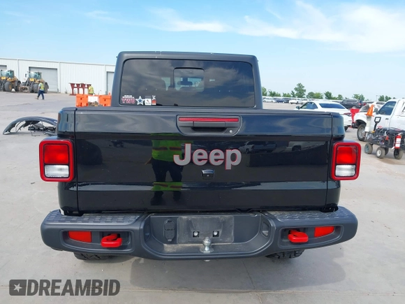 2021 Jeep Gladiator Rubicon z VIN 1C6JJTBG6ML535939, wystawiony jako IAAI lot #42260764 z przebiegiem 114 060 mil mil oraz . Historia ofert i sprzedaży dostępna na DreamBid. Obrazek 16.