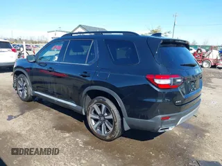2023 Honda Pilot Elite with VIN 5FNYG1H80PB017732, listed as a IAAI auction lot 41643842 with 26,420 mi miles. Bid and sale history available at carsss.com. Image 3.