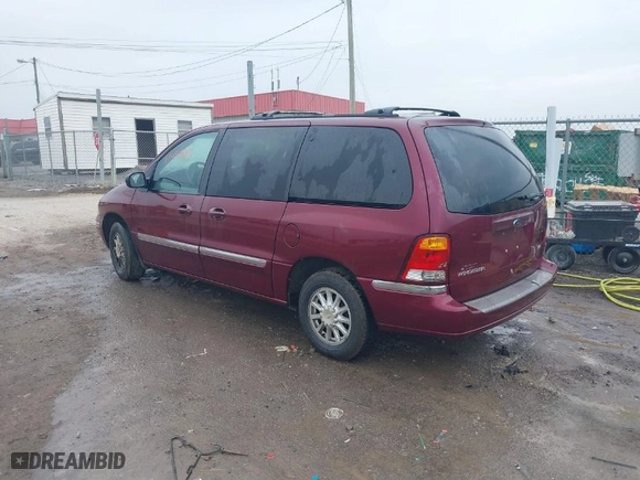 2000 Ford Windstar Wagon SE with VIN 2FMZA5242YBA26977, listed as a IAAI auction lot 41499880 with 1 mi miles. Bid and sale history available at carsss.com. Image 3.