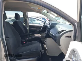 2012 Dodge Grand Caravan SE with VIN 2C4RDGBGXCR360045, listed as a IAAI auction lot 42068008 with 146,907 mi miles and . Bid and sale history available at DreamBid. Image 5.