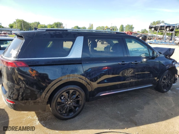 2023 Kia Carnival SX Prestige with VIN KNDNE5H39P6211336, listed as a Copart auction lot 57031024 with 22,961 mi miles and Salvage Title. Bid and sale history available at carsss.com. Image 3.