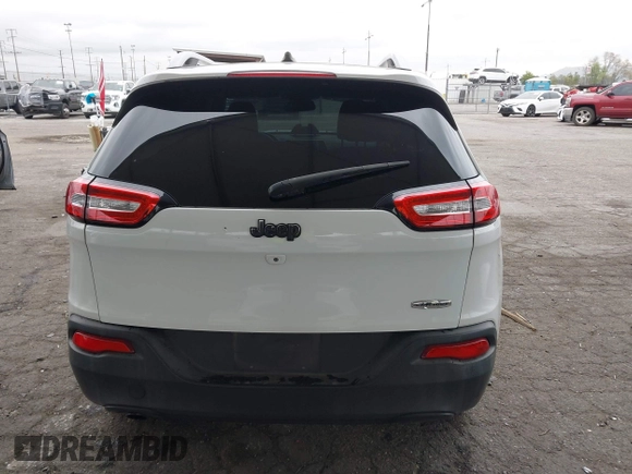 2015 Jeep Cherokee Latitude with VIN 1C4PJLCB5FW642701, listed as a IAAI auction lot 42063262 with 142,501 mi miles and . Bid and sale history available at carsss.com. Image 16.