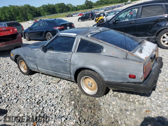 1982 Datsun 280ZX z VIN JN1HZ04S1CX447813, wystawiony jako Copart lot #56649125 z przebiegiem 285 290 mil mil oraz Tytuł czysty. Historia ofert i sprzedaży dostępna na DreamBid. Obrazek 2.