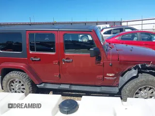 2008 Jeep Wrangler Unlimited Sahara с VIN 1J4GA59118L594851, выставлен на аукционе IAAI как лот 41643490 с пробегом 59 421 миль миль и . История ставок и продаж доступна на DreamBid. Изображение 14.