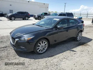 2017 Mazda 3 Touring z VIN 3MZBN1V79HM124716, wystawiony jako Copart lot #54564155 z przebiegiem 80 625 mil mil oraz Szkoda całkowita • Salvage title. Historia ofert i sprzedaży dostępna na DreamBid. Obrazek 1.