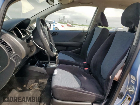 2008 Honda Fit with VIN JHMGD38438S068027, listed as a Copart auction lot 61033815 with 151,639 mi miles and Salvage title. Bid and sale history available at DreamBid. Image 7.