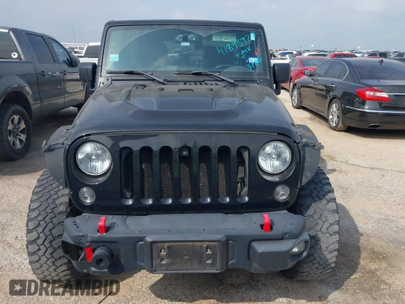 2015 Jeep Wrangler Unlimited Rubicon z VIN 1C4BJWFG2FL572417, wystawiony jako IAAI lot #41895927 z przebiegiem 54 981 mil mil oraz . Historia ofert i sprzedaży dostępna na DreamBid. Obrazek 12.