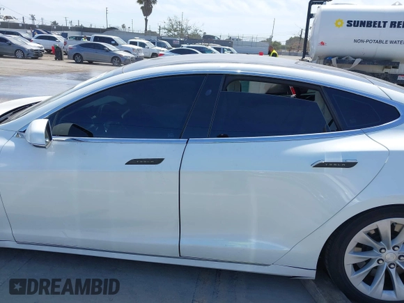 2018 Tesla Model S 75D with VIN 5YJSA1E25JF245269, listed as a IAAI auction lot 41914567 with 56,086 mi miles and . Bid and sale history available at DreamBid. Image 15.
