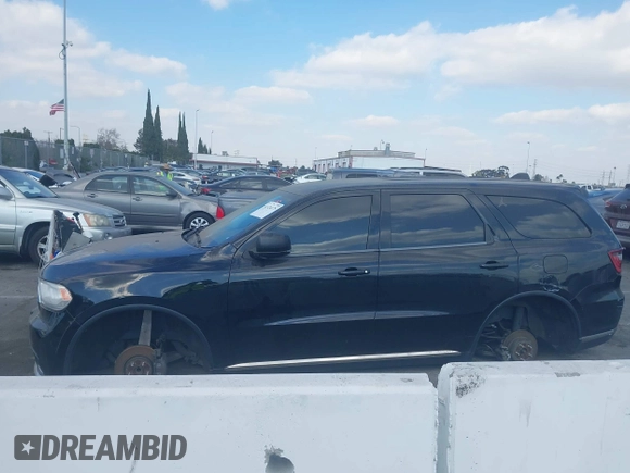 2019 Dodge Durango SXT Plus with VIN 1C4RDHAG1KC535197, listed as a IAAI auction lot 41324175 with 104,037 mi miles and . Bid and sale history available at DreamBid. Image 14.